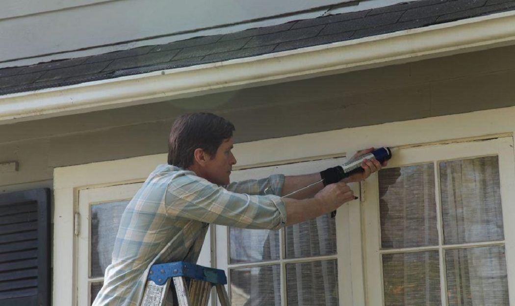 Homeowner Helpers caulking windows and doors