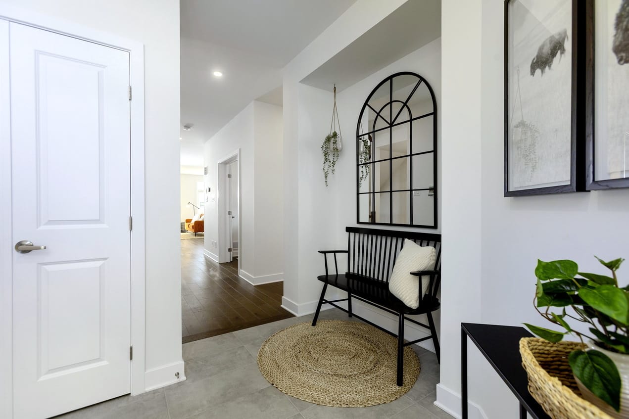 Ottawa construction two-storey single Hazelton riverside south net zero ready foyer arched mirror bench seating