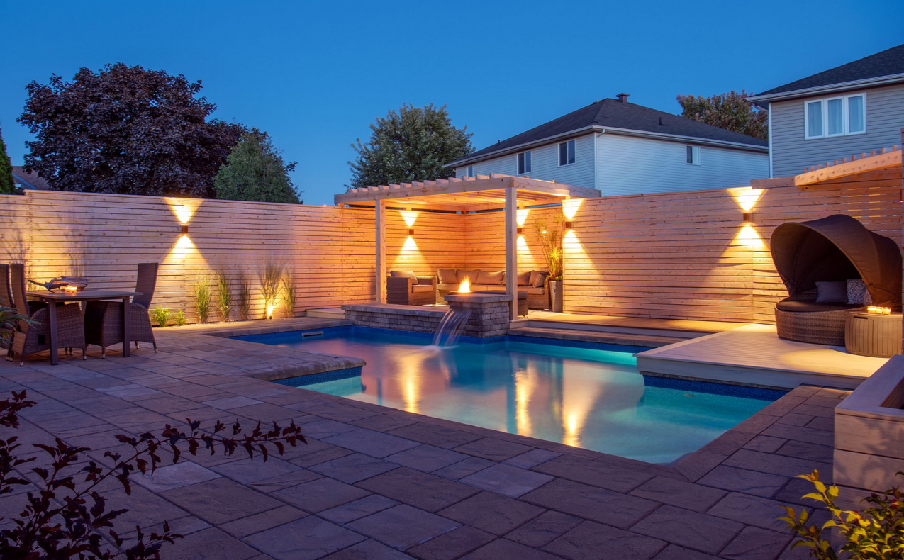 2023 Round 6 All Things Home People's Choice Award Ottawa design lagois design-build-renovate backyard oasis pool night lighting ottawa renovations