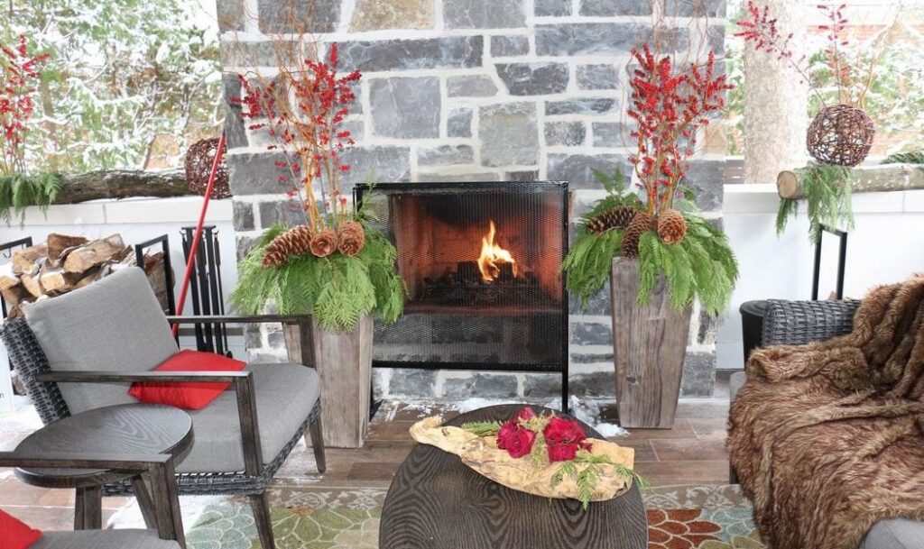 Homes for the Holidays Mill Street Florist Christmas decorating outdoor fireplace outdoor room