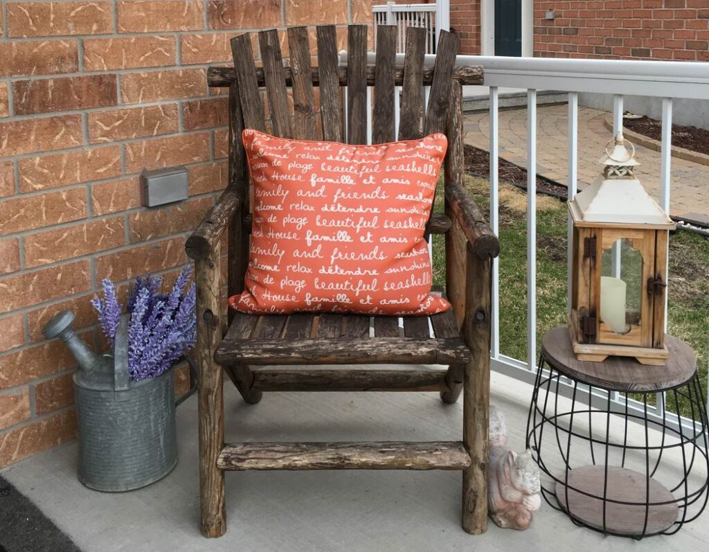 how to create outdoor spaces front porch rocking chair watering can hurricane lamp Sue Pitchforth