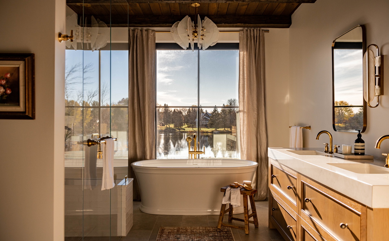 ensuite standalone tub award-winning custom home west of main art & stone group